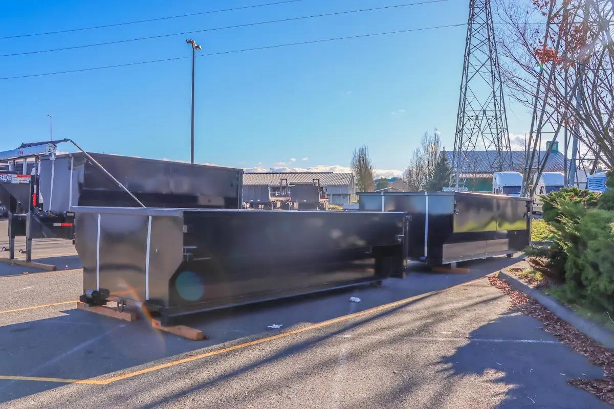 Roll-off dumpster ready for waste disposal at job site for 3 Yard Dumpster Rental in Mayflower Village